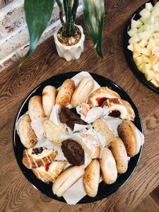 event catering pastry platter featuring bagels and other baked goods