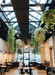 elegant private event space with hanging greenery